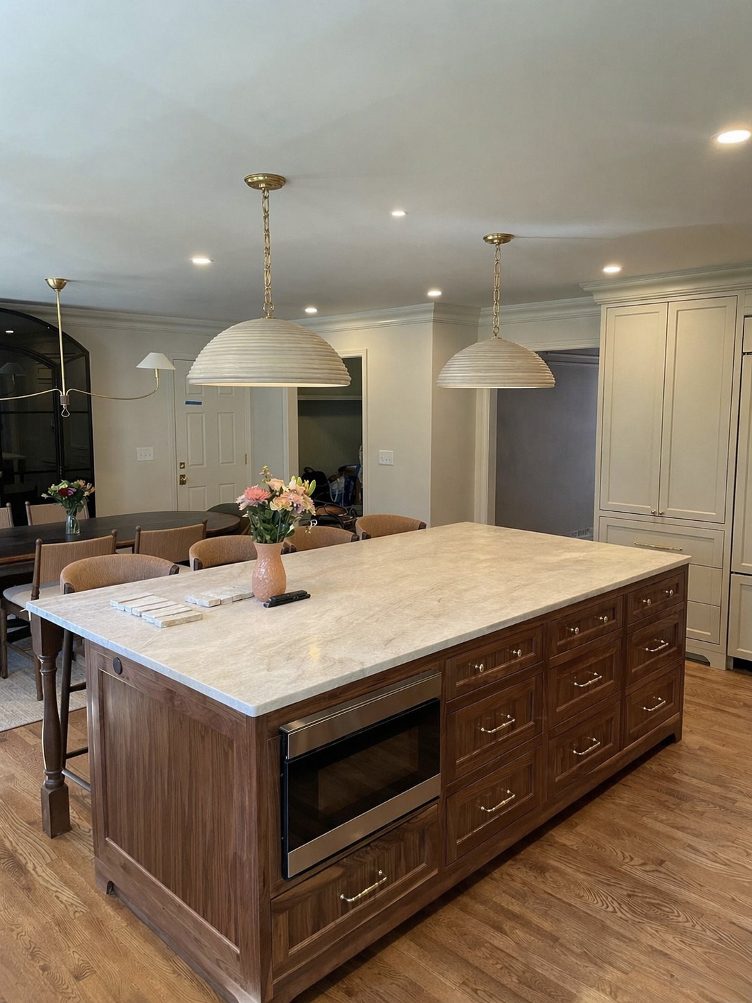 Custom kitchen island with solid countertop built by Designer Carpenter
